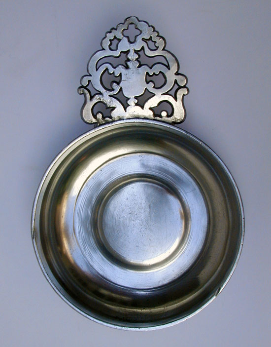 A Near Mint Pewter Flower Handle Porringer