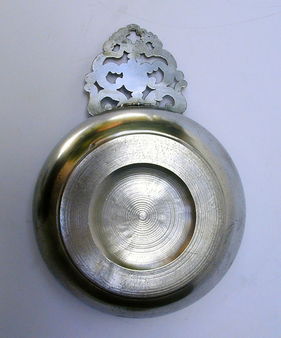 A Near Mint Pewter Flower Handle Porringer